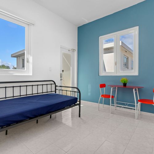 Our multi-functional living area seamlessly blends comfort with utility, featuring a cozy sofa (or sofa bed) where you can read, lounge, or simply enjoy a quiet evening.