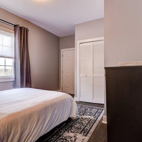 Soft, neutral bedroom w/ a relaxed, restful vibe.