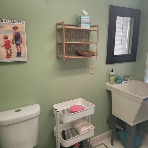 Bathroom #2 (main floor):  full bathroom with a walk-in shower and also a stacked washer and dryer.