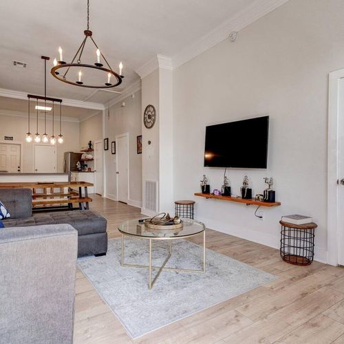 Spacious living area w/ a flatscreen TV — a great spot to unwind after a day out.