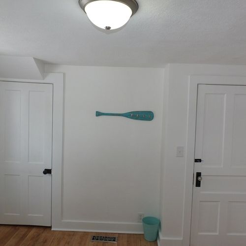 Bedroom #1 (downstairs):  the closet door is on the left and the door to the bedroom is on the right.