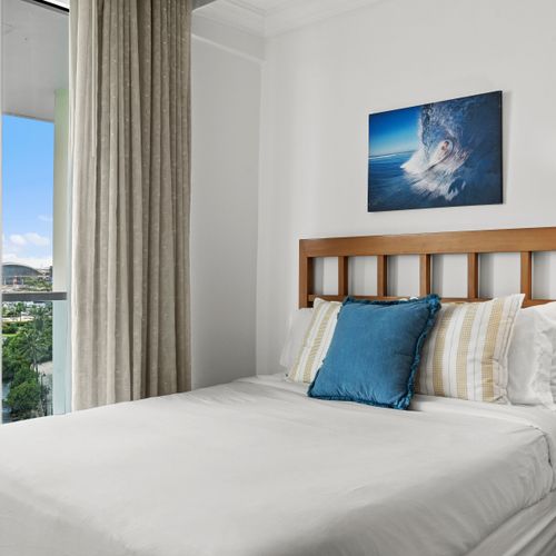 Relax in style with cozy bedding, ambient lighting, and captivating vistas from your room.