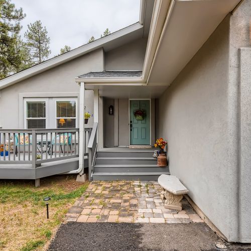 The charming open deck is the perfect place to relax and soak in the breathtaking views.