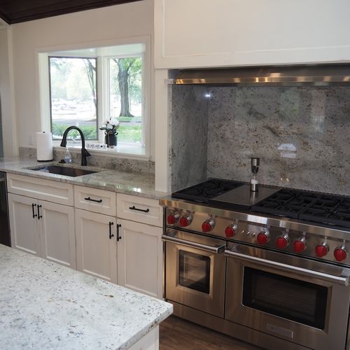 Kitchen:  very high-end dual-oven, stovetop / grill, sink, and dishwasher.