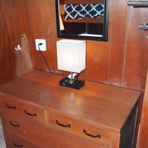 Bedroom #2:  features a full-on-full bunk bed, dresser, closet, and lamps.