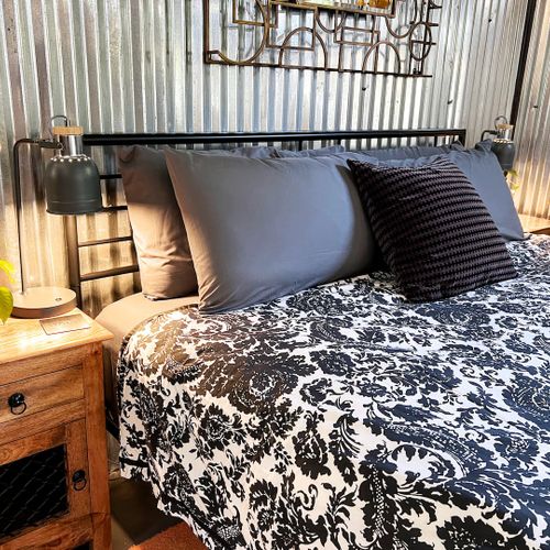 Bedside lamps w/ built-in USB ports — charge up & wind down with ease.
