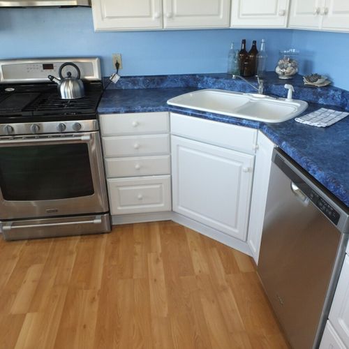 Kitchen:  showing the gas range, sink, and dishwasher