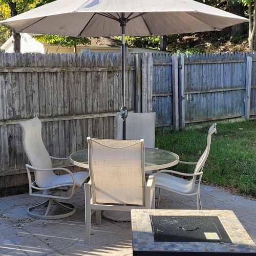 Exterior:  the outdoor dining furniture and the fire table.