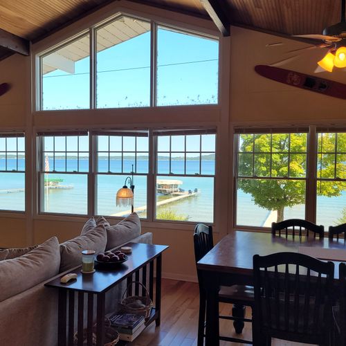 OVERVIEW:  The great view of Crystal Lake from both the main living room (Living Room #1) and the dining room.