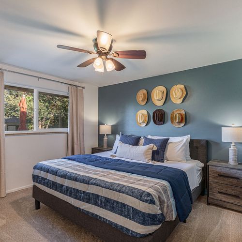 Modern design meets comfort in this calming, spacious bedroom retreat.