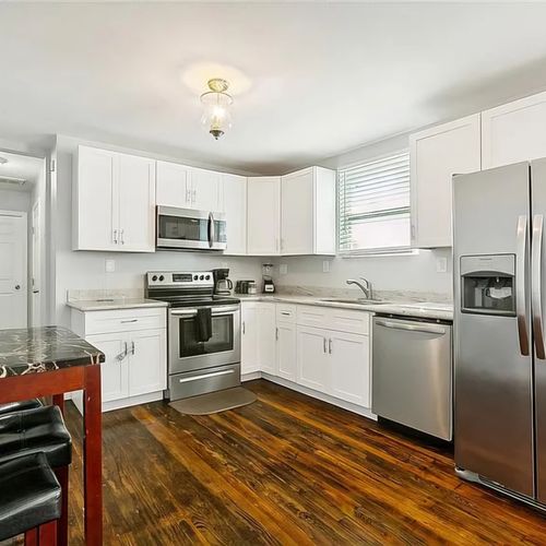 Fully equipped kitchen—perfect for relaxing or cooking up a delicious meal after a day in NOLA!