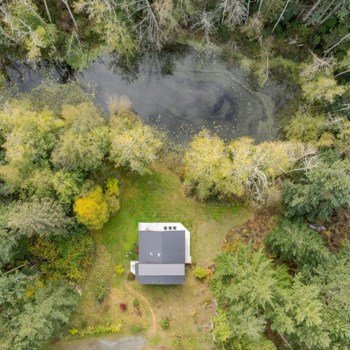 Bird's eye view of Dragonfly Pond farmhouse and pond.