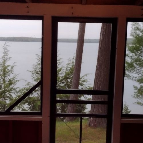 Front porch:  the cabin has a fun front porch that is screened-in, has a swing and picnic table, and has a great view of little platte lake.