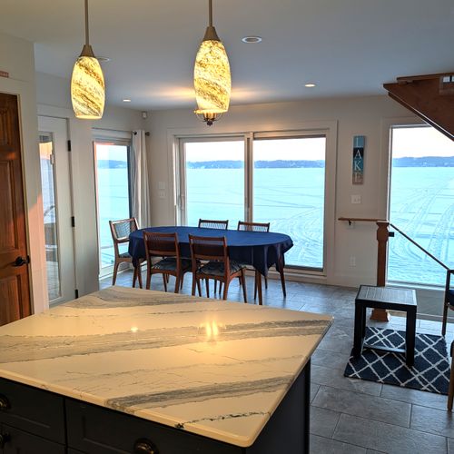 OVERVIEW:  The home has a gorgeous dining area on the main floor with a spectacular view of Crystal Lake!