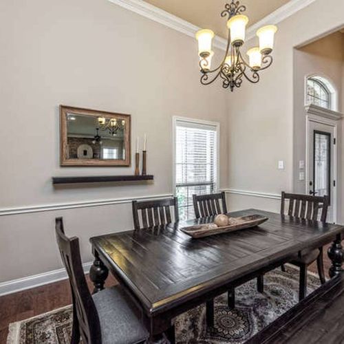 Host dinners in this formal dining space, surrounded by curated decor and Texas charm - a table built for family-style laughter