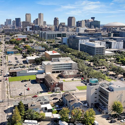 An aerial view showcasing our prime location in the heart of New Orleans, just minutes away from the city's top attractions, with a private pool and spacious outdoor area for ultimate relaxation.