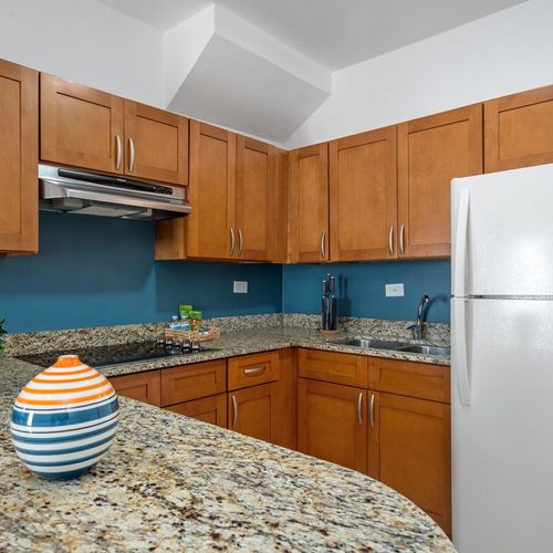 Cook, dine, and entertain in our modern and well-designated kitchen.