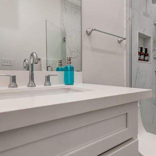 Ensuite master bath sink area w/ a wide vanity & plenty of counter space.
