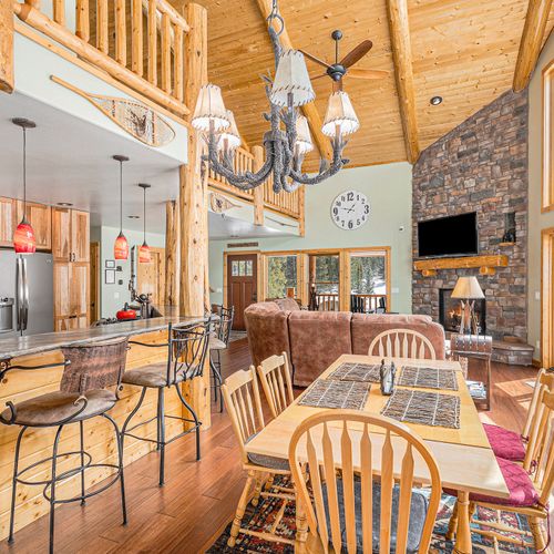 Enjoy open, connected areas filled with natural light and mountain views.
