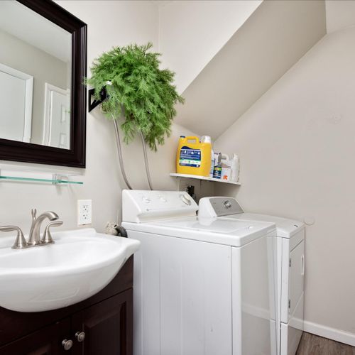 The downstairs bathroom is also the laundry room with a washer and dryer for use during your stay.