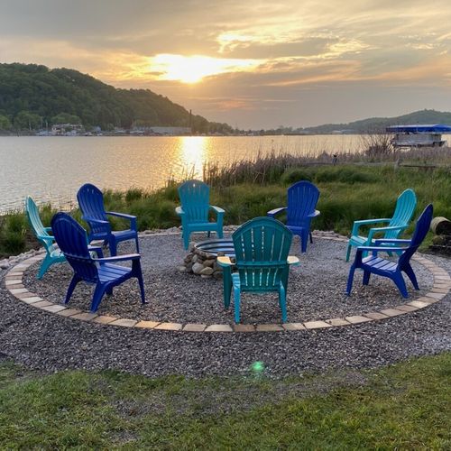Exterior:  the large bonfire ring with seating for 8 adults and a great view of betsie lake!
