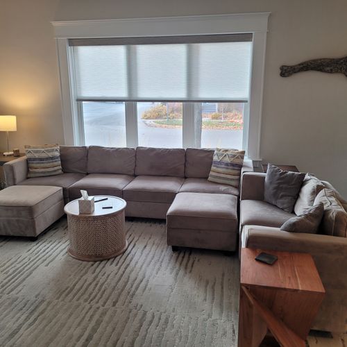 LIVING ROOM:  Gorgeous living room that features a gas fireplace and a large television with live streaming via Hulu, Netflix, and Disney+.