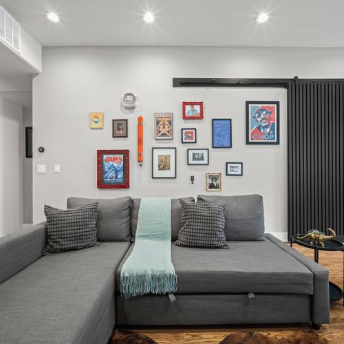 Spacious sectional sofa doubles as a sofa bed for comfortable sleeping.