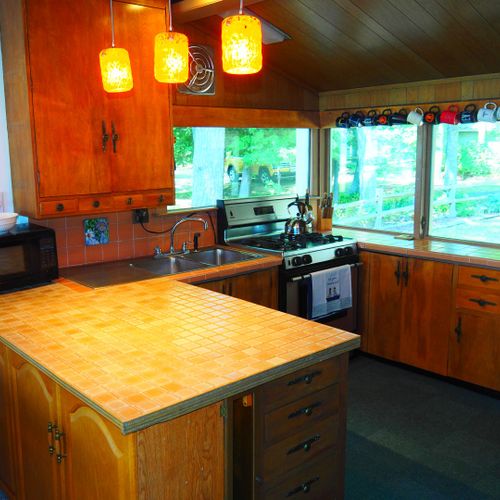 Kitchen:  all appliances and a good supply of cooking and dining utensils.
