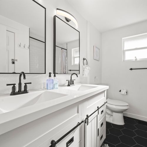 Elevate your morning routine in the newly redone bathroom in the lower level–so clean and spacious!
