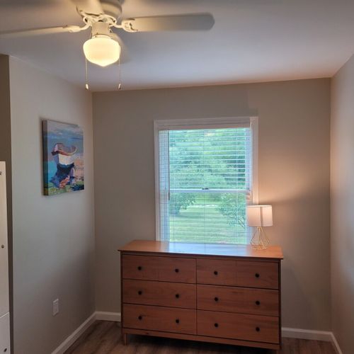 Bedroom #3:  bedroom #3 features a twin-on-twin bunk bed, ceiling fan, dresser, and closet.