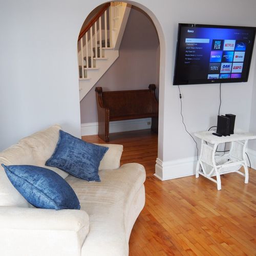 Living room:  the house has a beautifully remodeled and comfy living room that is great for relaxing! The large flat screen television includes streaming services with pureflix, netflix, disney+, and hbo max all included!