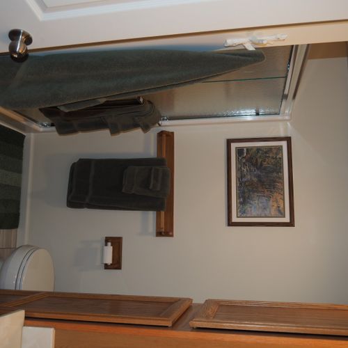 Bathroom:  full bathroom with a walk-in shower as well as a stacked washer and dryer.