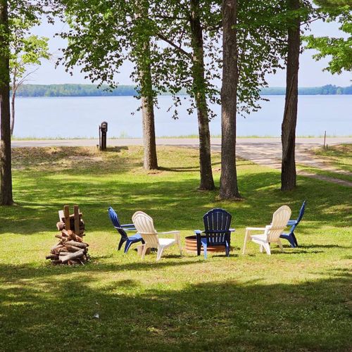 Overall:  the private bonfire ring with manistee lake in the background.