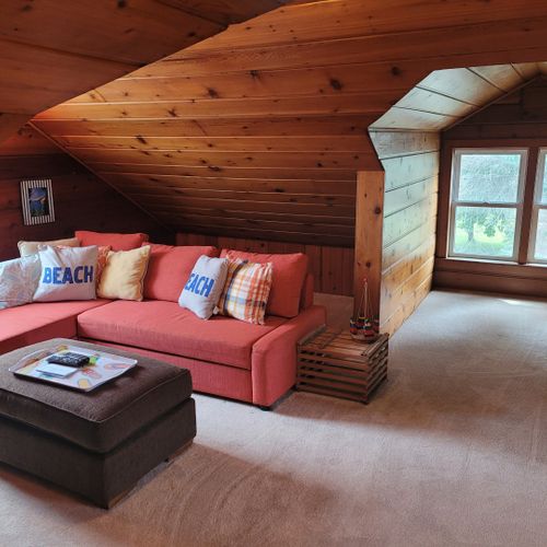 Bedroom #4 (larger hosue, second floor):  this is a large private area with its own sectional sofa, television, desk, and two twin beds.