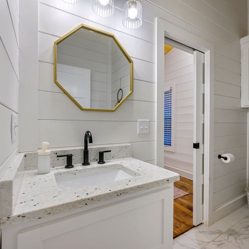 The single vanity in the private bath.