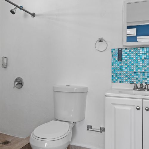 Experience comfort and style in our newly renovated modern bathroom.