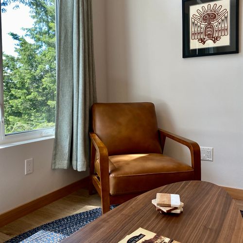 Settle in with a good book on Orcas Island history, framed by original Pacific Northwest art and tall firs.