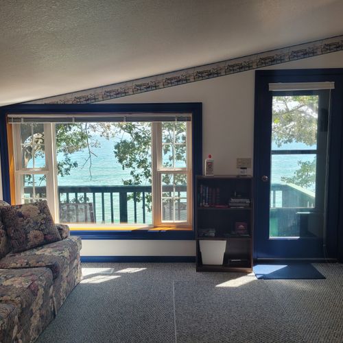 Main room:  the window to the lake and the entrance to the apartment