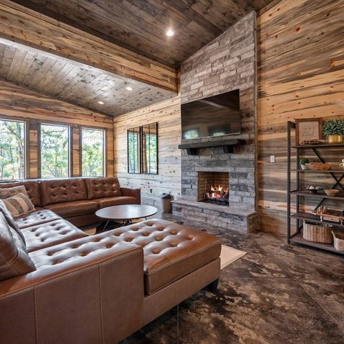 An oversized sectional around the gas fireplace.