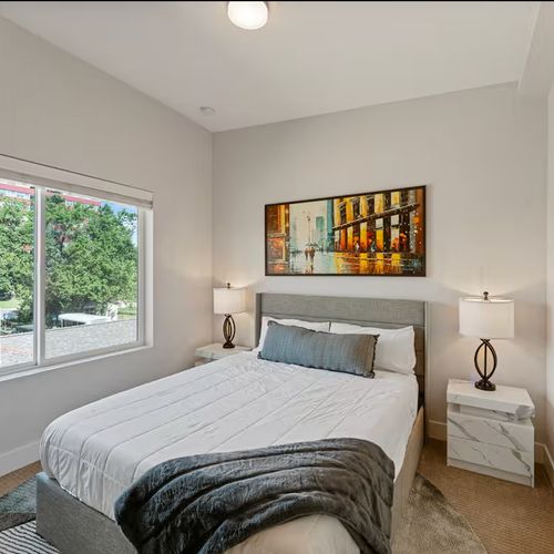 Rest easy in a plush bed, while stylish accents complete the space.
