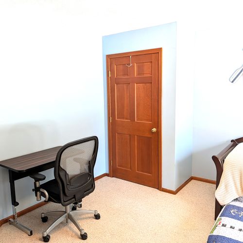 BEDROOM #1 (FIRST FLOOR):  There is a small bedroom with a trundle bed on the first floor.  Includes a closet, dresser, and mirror as well.