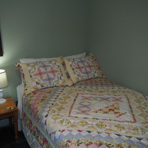 Bedroom #2:  one of the two full-size beds in the bedroom.