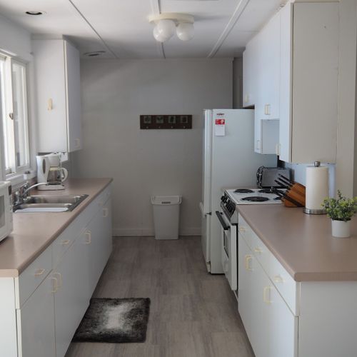 Kitchen:  the cottage has a very cute galley kitchen with all critical appliances. (there is no dishwasher though. )