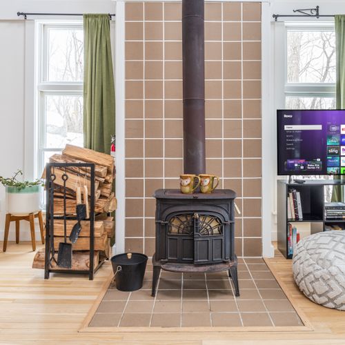 The wood stove in the guest house keeps things nice and cozy.