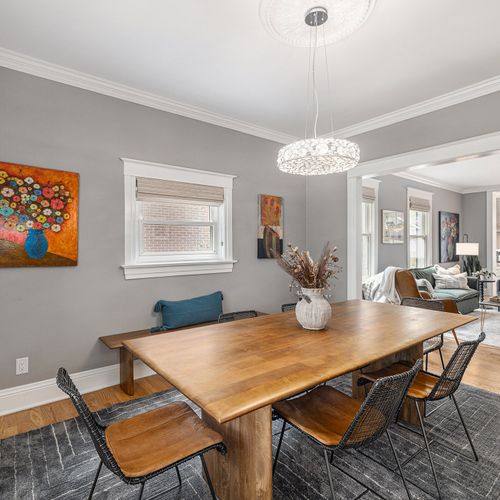 Spacious dining area: dine under the modern chandelier and stylish ambiance
