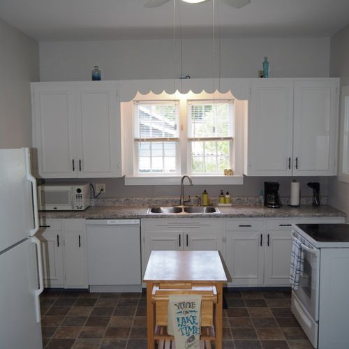 Kitchen:  the home has a huge kitchen that is complete with all modern appliances, including a dishwasher. A good supply of cooking and dining utensils are included as well.