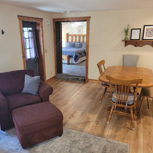 DINING AREA:  Looking out from the living room towards the dining area, which has seating for 5 adults.