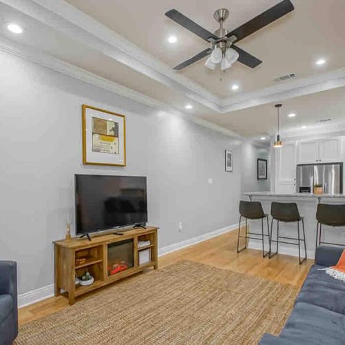 Open living room & kitchen combo — ideal for gathering, cooking, & hanging out together.