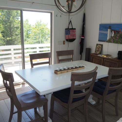 Dining area:   dining table and chairs for 8 adults.
