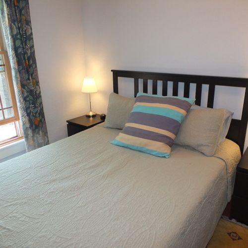 Bedroom #2 (second floor):  this bedroom features a queen-size bed, large closet, nightstands, lamps, and a baby crib! It is on the second floor.
